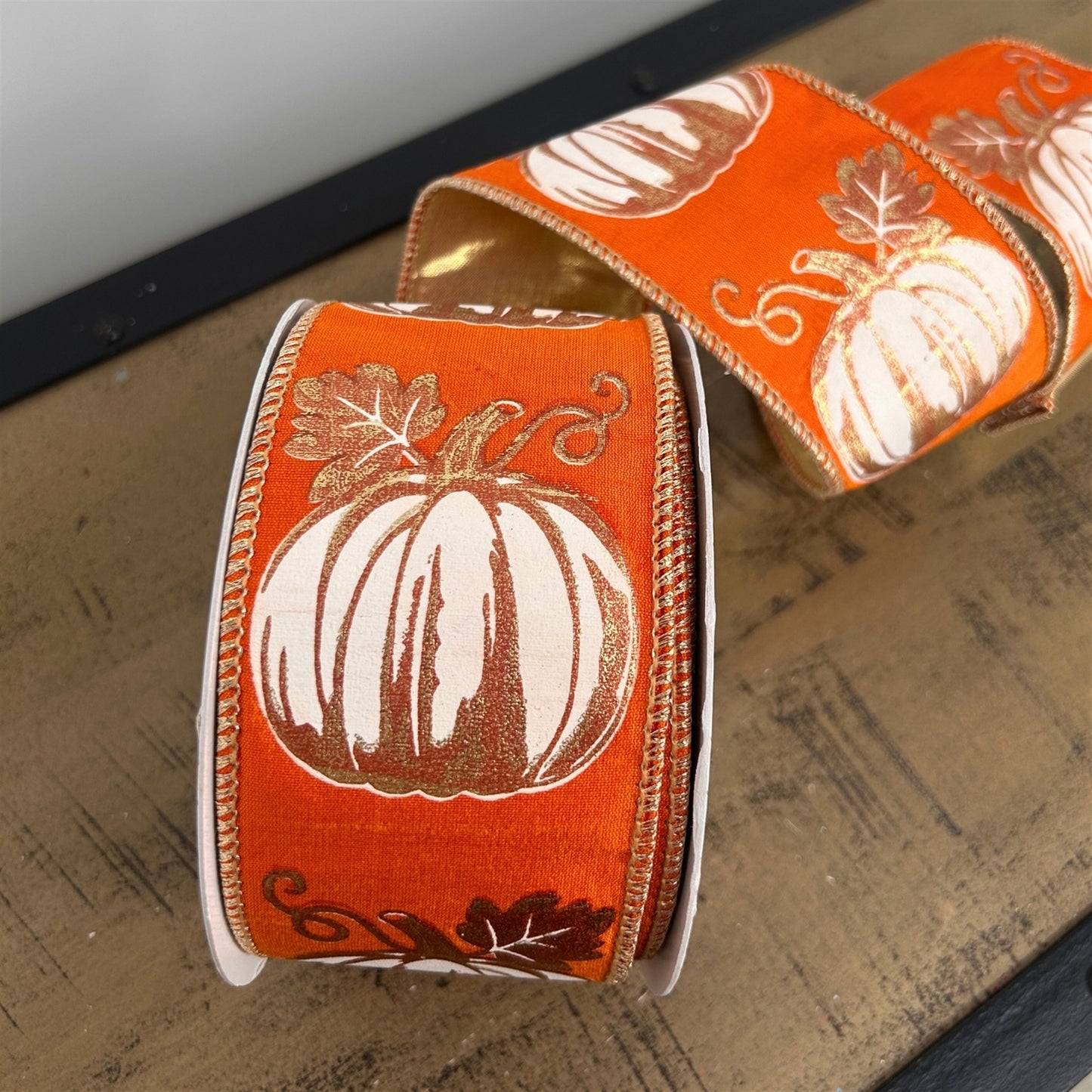 MODERN PUMPKIN PRINT ON ORANGE RIBBON W/GOLD BACK 2.5” X 10 YD